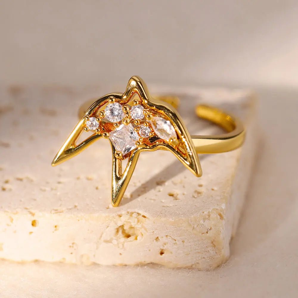 Anillo de golondrina de circones - Podios