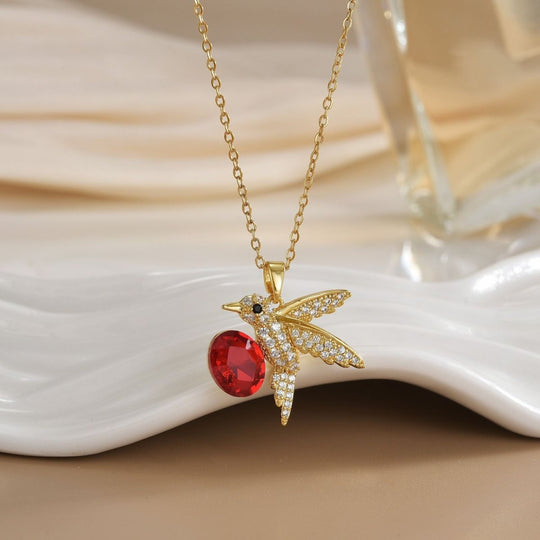 Collar Alas de Amor - Un colibrí que simboliza amor y energía, con circones brillantes y caja giratoria incluida - Podios