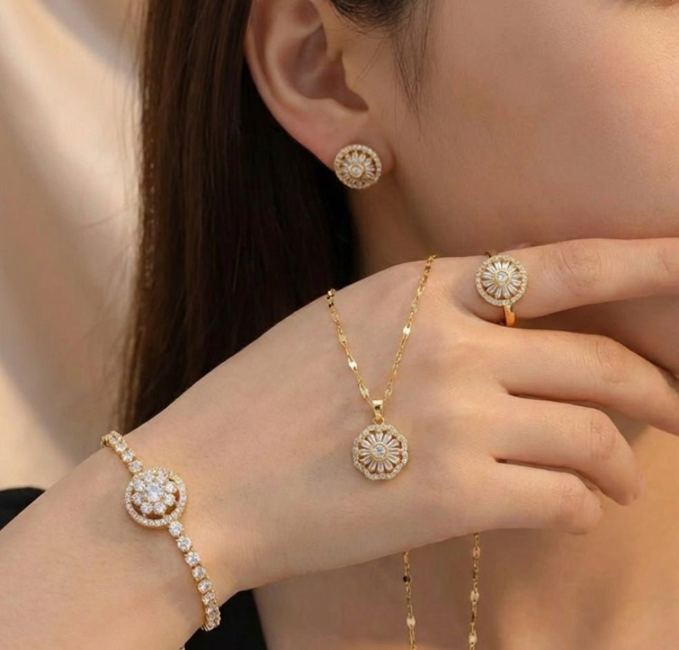 GiraSun - Set de anillo, pulsera, aros y collar giratorio de sol crisantemo - bañado en oro 14k - Podios