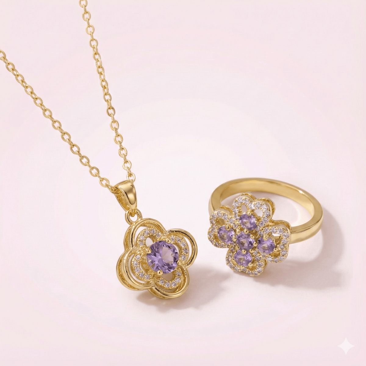 Lumiere Blossom Set - collar y anillo de trébol giratorio enchapado en oro 14k con cristal lila en caja de Rosa - Podios