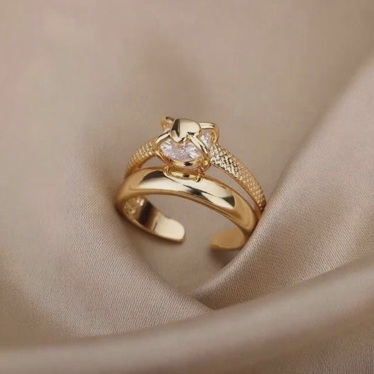 Carry me ONE™ Exclusivo anillo de corazón en doble capa, bañado en oro y ajustable