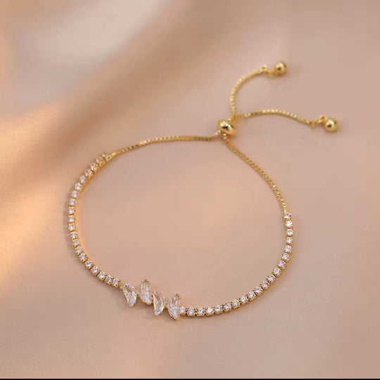 Pulsera de Mariposas Tu & Yo - ajustable y bañada en oro 18k - Podios